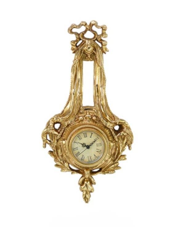 Antiklook goldene Wanduhr mit verziertem Schleifenmotiv